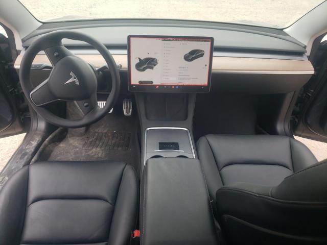 Photo 8 from auction – 2021 TESLA MODEL 3 with VIN 5YJ3E1EB7MF984303