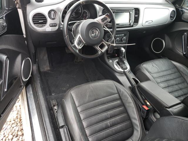 Photo 8 from auction – 2014 VOLKSWAGEN BEETLE with VIN 3VWJL7AT7EM655769