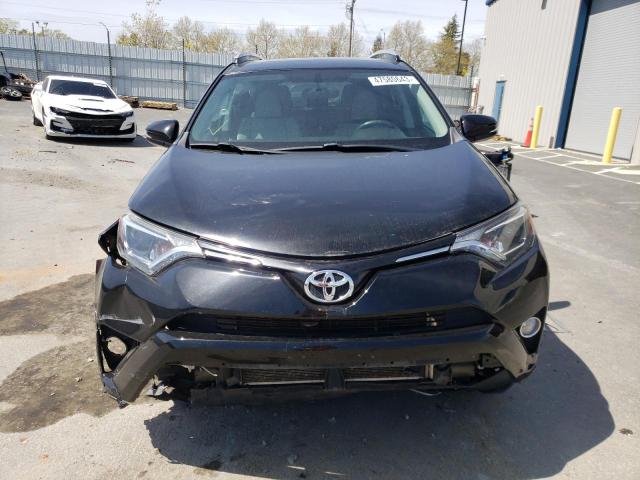 Photo 5 from auction – 2016 TOYOTA RAV4 XLE with VIN 2T3WFREV8GW246432