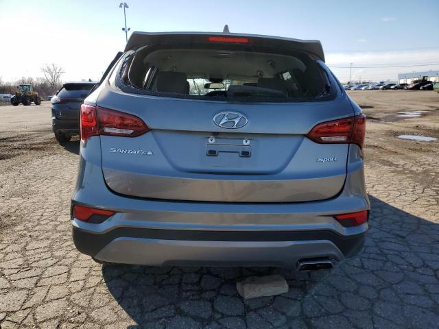 Photo 6 from auction – 2018 HYUNDAI SANTA FE S with VIN 5NMZU3LB7JH100883