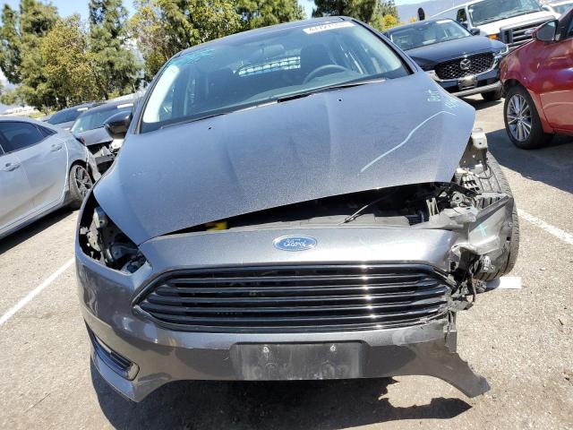 Photo 5 from auction – 2018 FORD FOCUS SE with VIN 1FADP3FE6JL230505