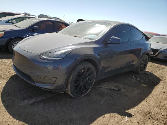 TESLA MODEL Y 2022 with VIN 7SAYGDEE0NF395805 - Photo from auction
