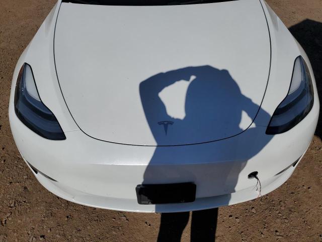 Photo 11 from auction – 2022 TESLA MODEL Y with VIN 7SAYGDEE2NF387088