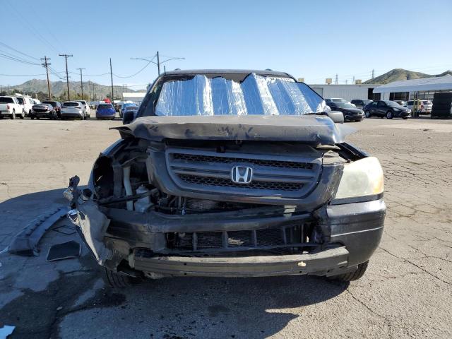 Photo 5 from auction – 2004 HONDA PILOT EX with VIN 2HKYF18404H614716