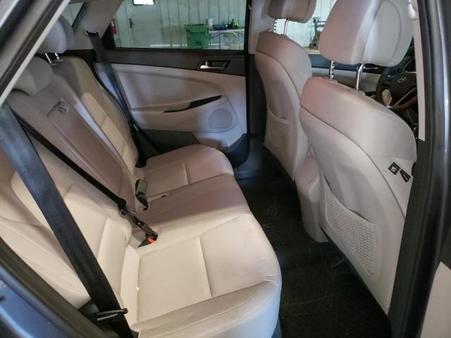 Photo 11 from auction – 2018 HYUNDAI TUCSON SEL with VIN KM8J3CA45JU653220