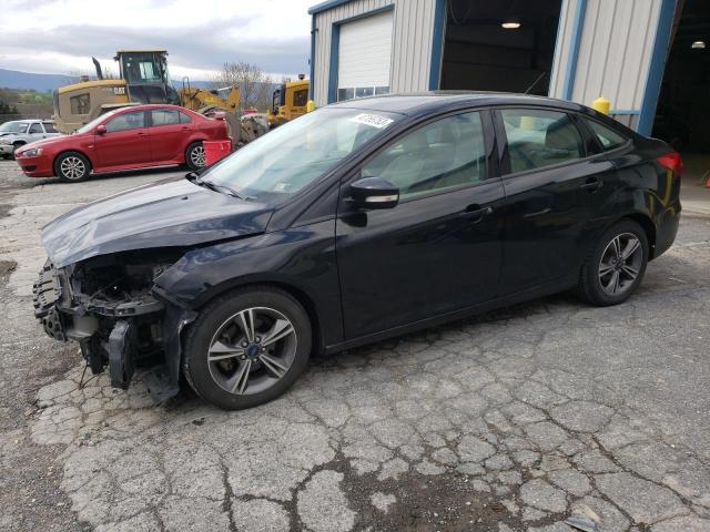 FORD FOCUS SE 2017 with VIN 1FADP3FEXHL289597 - Photo from auction