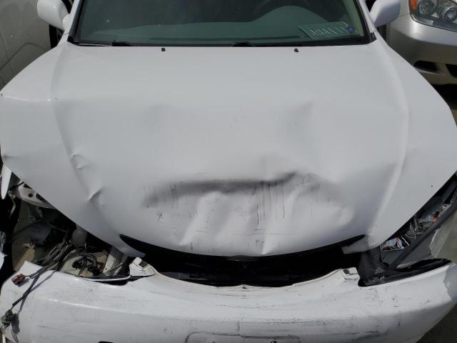 Photo 11 from auction – 2002 TOYOTA CAMRY LE with VIN JTDBE32K320105807