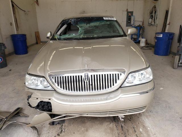 Photo 5 from auction – 2004 LINCOLN TOWN CAR E with VIN 1LNHM81W74Y661908
