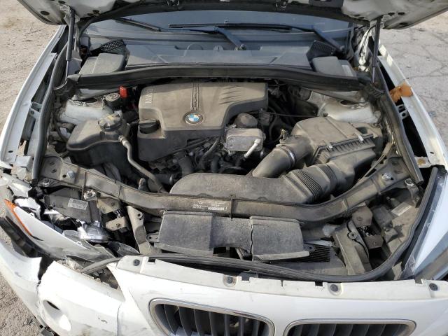Photo 11 from auction – 2015 BMW X1 SDRIVE2 with VIN WBAVM1C55FV316123