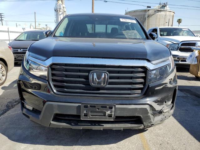 Photo 5 from auction – 2023 HONDA RIDGELINE with VIN 5FPYK3F58PB010585