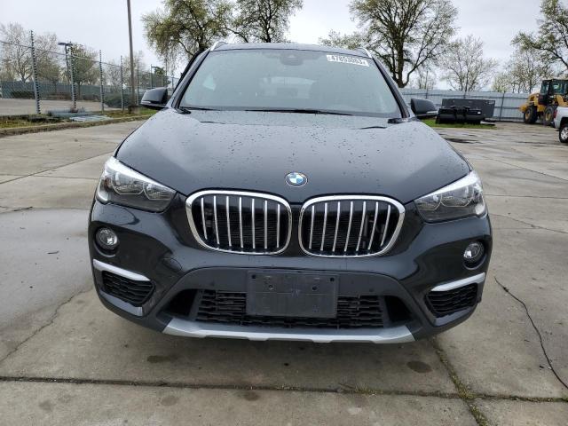 Photo 5 from auction – 2019 BMW X1 XDRIVE2 with VIN WBXHT3C52K5L39077