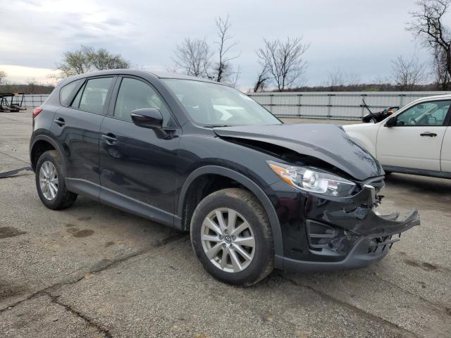 Photo 4 from auction – 2016 MAZDA CX-5 SPORT with VIN JM3KE2BE0G0842952