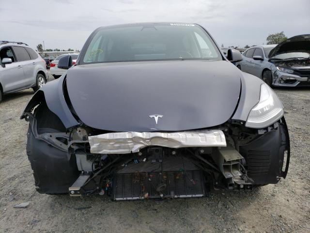 Photo 5 from auction – 2021 TESLA MODEL Y with VIN 5YJYGDEE6MF275759