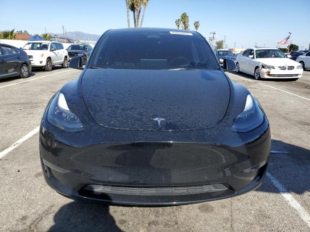 Photo 5 from auction – 2022 TESLA MODEL Y with VIN 7SAYGDEFXNF410321