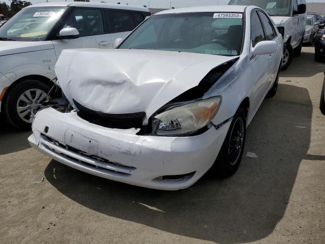 TOYOTA CAMRY LE 2002 with VIN JTDBE32K320105807 - Photo from auction