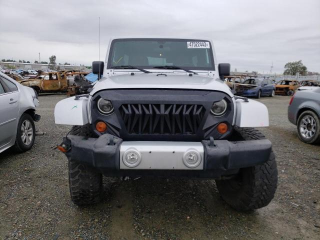 Photo 5 from auction – 2011 JEEP WRANGLER U with VIN 1J4BA5H16BL620153