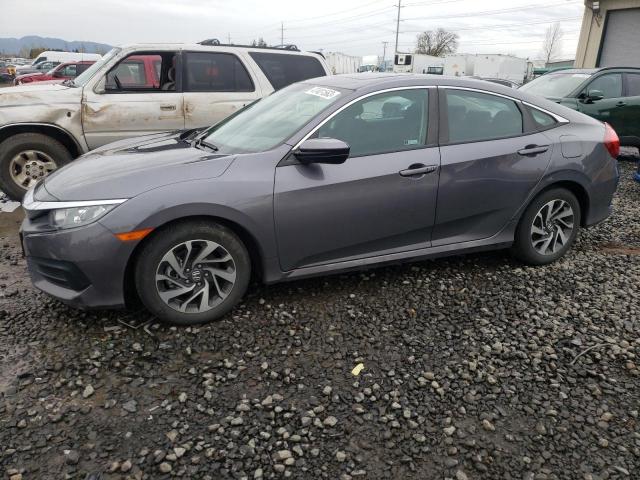 HONDA CIVIC EX 2018 with VIN 2HGFC2F74JH572124 - Photo from auction