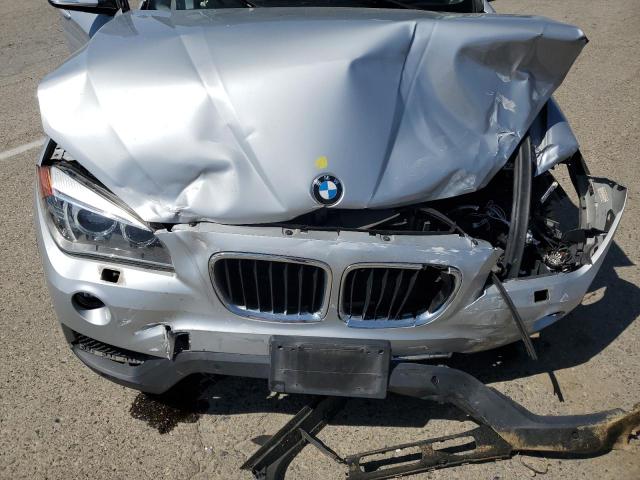 Photo 12 from auction – 2014 BMW X1 XDRIVE3 with VIN WBAVM5C54EVV93299