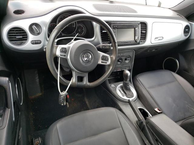 Photo 8 from auction – 2014 VOLKSWAGEN BEETLE with VIN 3VW517AT6EM820900