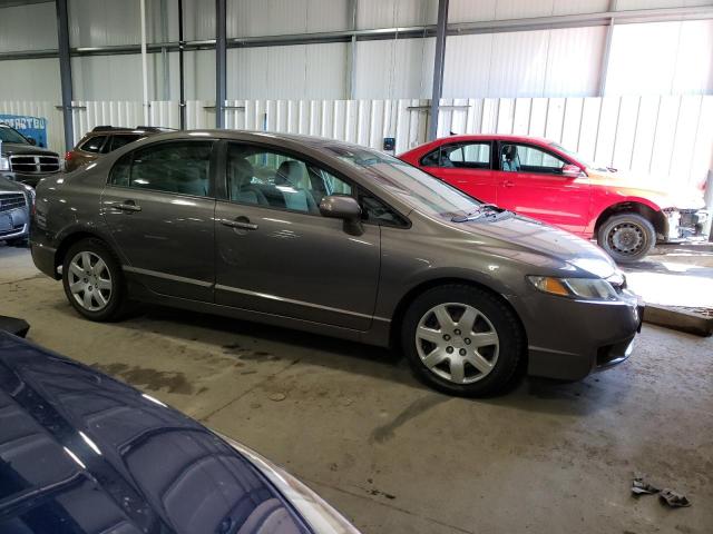 Photo 4 from auction – 2011 HONDA CIVIC LX with VIN 19XFA1F56BE032297
