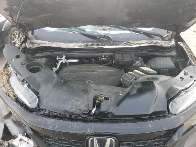 Photo 12 from auction – 2021 HONDA PASSPORT E with VIN 5FNYF8H58MB002439