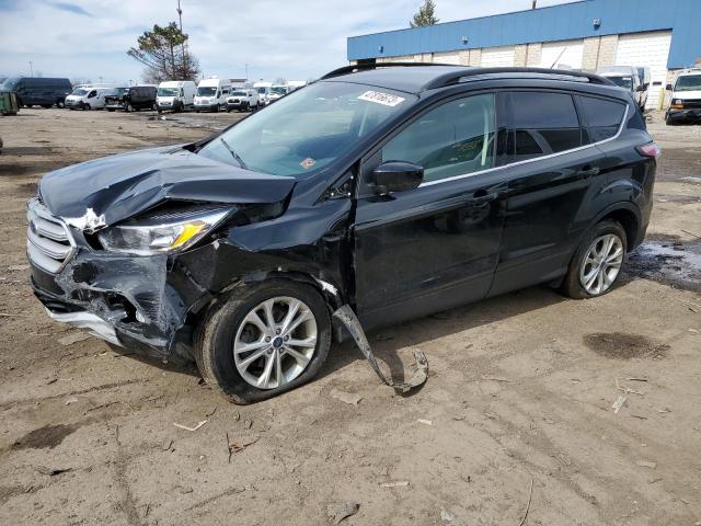 FORD ESCAPE SE 2018 with VIN 1FMCU0GD7JUD18505 - Photo from auction