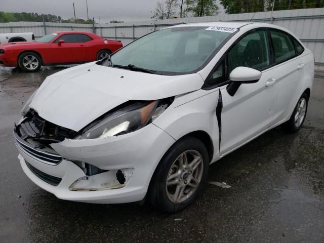 FORD FIESTA SE 2018 with VIN 3FADP4BJXJM128549 - Photo from auction