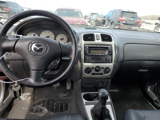 Photo 8 from auction – 2003 MAZDA PROTEGE PR with VIN JM1BJ245431131406