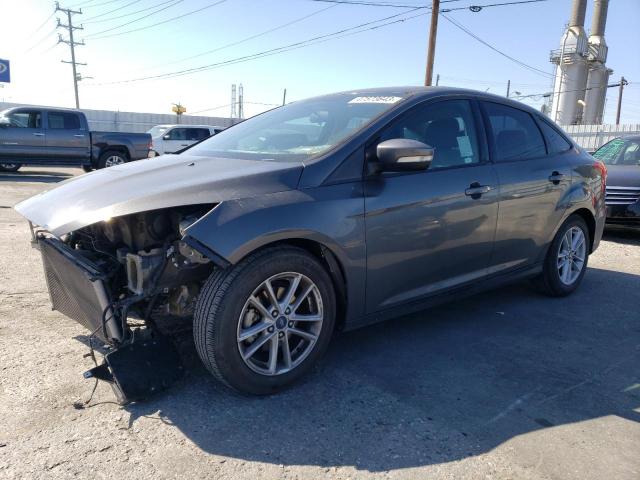FORD FOCUS SE 2017 with VIN 1FADP3F20HL319437 - Photo from auction