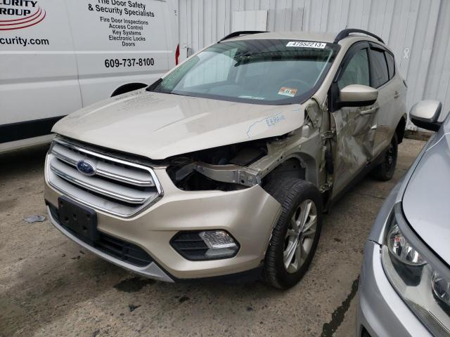 FORD ESCAPE SE 2018 with VIN 1FMCU0GD1JUA58652 - Photo from auction