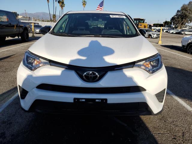 Photo 5 from auction – 2018 TOYOTA RAV4 LE with VIN 2T3ZFREV9JW438074