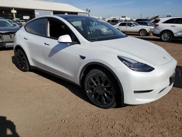 Photo 4 from auction – 2022 TESLA MODEL Y with VIN 7SAYGDEE2NF387088