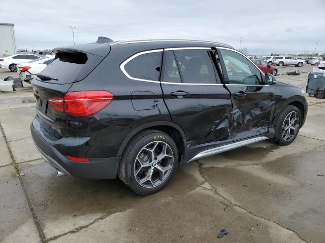 Photo 3 from auction – 2019 BMW X1 XDRIVE2 with VIN WBXHT3C52K5L39077