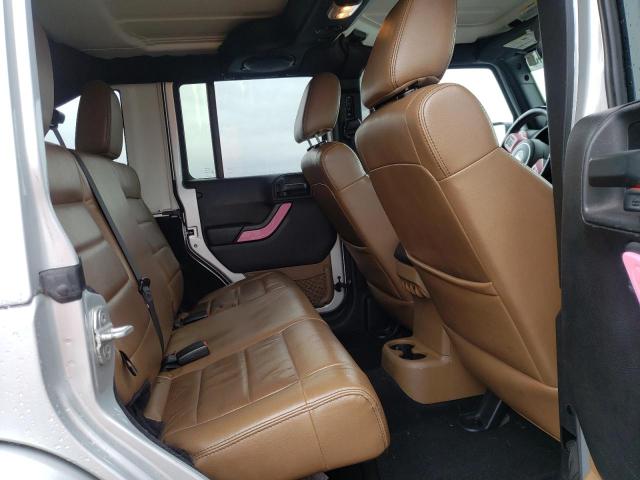 Photo 10 from auction – 2011 JEEP WRANGLER U with VIN 1J4BA5H16BL620153