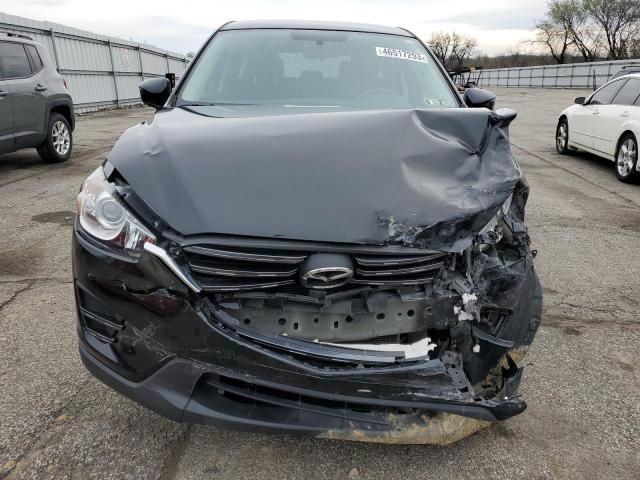 Photo 5 from auction – 2016 MAZDA CX-5 SPORT with VIN JM3KE2BE0G0842952