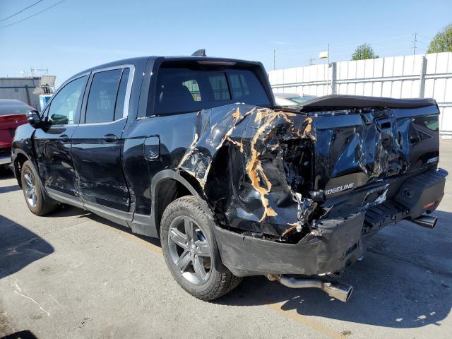 Photo 2 from auction – 2023 HONDA RIDGELINE with VIN 5FPYK3F58PB010585