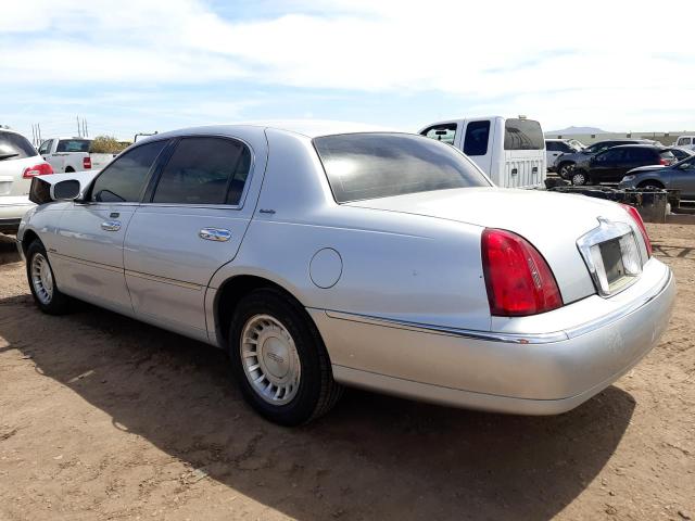 Photo 2 from auction – 2000 LINCOLN TOWN CAR E with VIN 1LNHM81W3YY777919