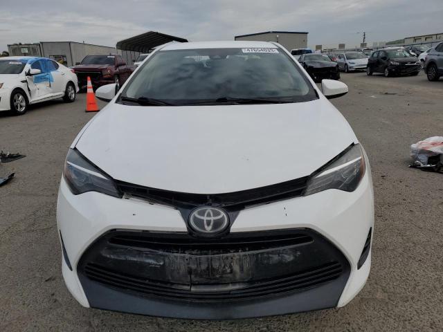 Photo 5 from auction – 2018 TOYOTA COROLLA L with VIN 2T1BURHE9JC009871