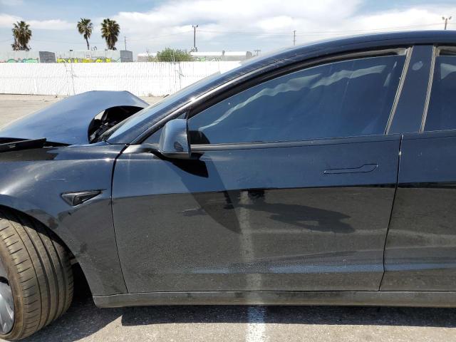 Photo 7 from auction – 2022 TESLA MODEL 3 with VIN 5YJ3E1EC6NF295928