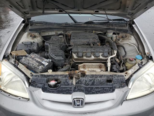 Photo 11 from auction – 2003 HONDA CIVIC DX with VIN 1HGEM21273L008980