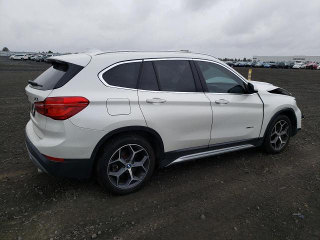 Photo 3 from auction – 2016 BMW X1 XDRIVE2 with VIN WBXHT3C3XGP886107