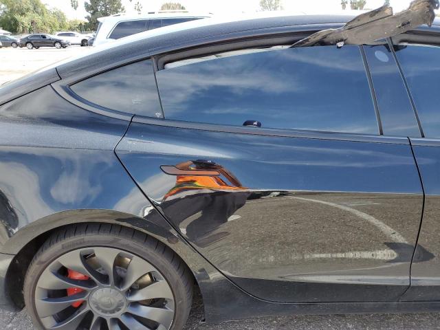 Photo 10 from auction – 2022 TESLA MODEL 3 with VIN 5YJ3E1EC6NF295928