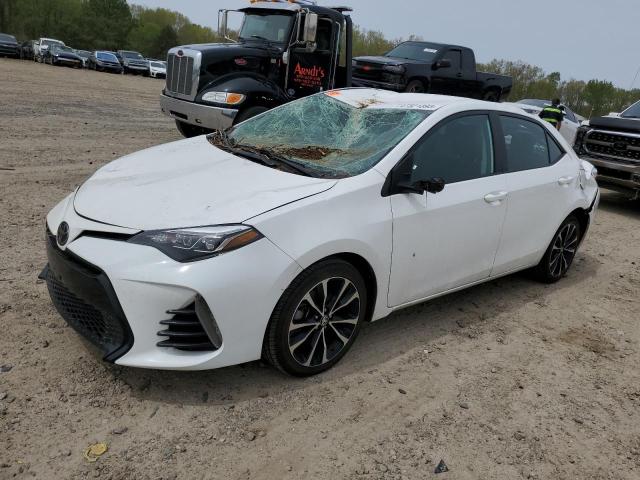 TOYOTA COROLLA L 2019 with VIN 5YFBURHE5KP928803 - Photo from auction