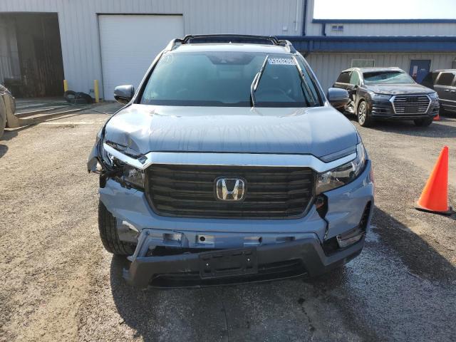 Photo 5 from auction – 2023 HONDA RIDGELINE with VIN 5FPYK3F77PB012460