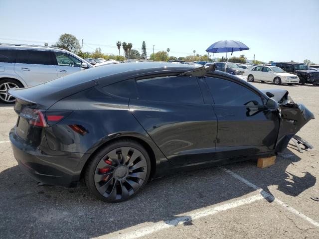 Photo 3 from auction – 2022 TESLA MODEL 3 with VIN 5YJ3E1EC6NF295928