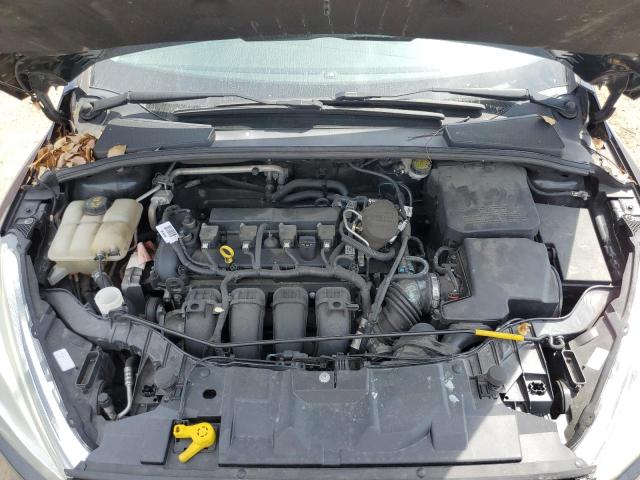 Photo 11 from auction – 2015 FORD FOCUS TITA with VIN 1FADP3N23FL298405
