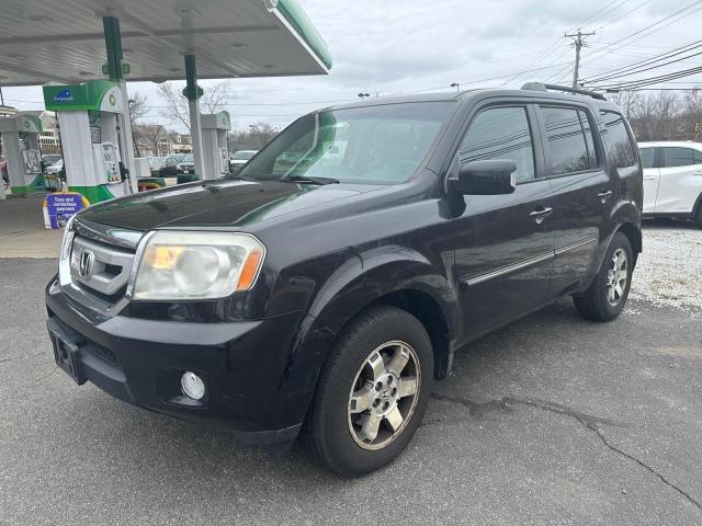 Photo 2 from auction – 2011 HONDA PILOT TOUR with VIN 5FNYF4H97BB007804