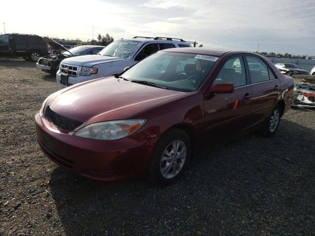 TOYOTA CAMRY LE 2004 with VIN 4T1BF30K44U078088 - Photo from auction