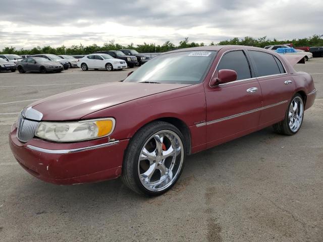 LINCOLN TOWN CAR E 1998 with VIN 1LNFM81W9WY644750 - Photo from auction