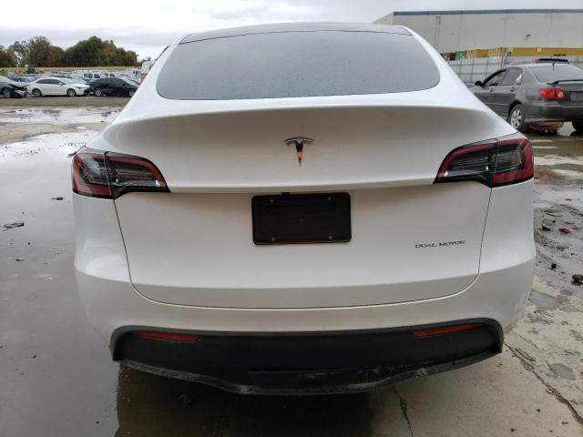 Photo 6 from auction – 2023 TESLA MODEL Y with VIN 7SAYGDEE1PA060035